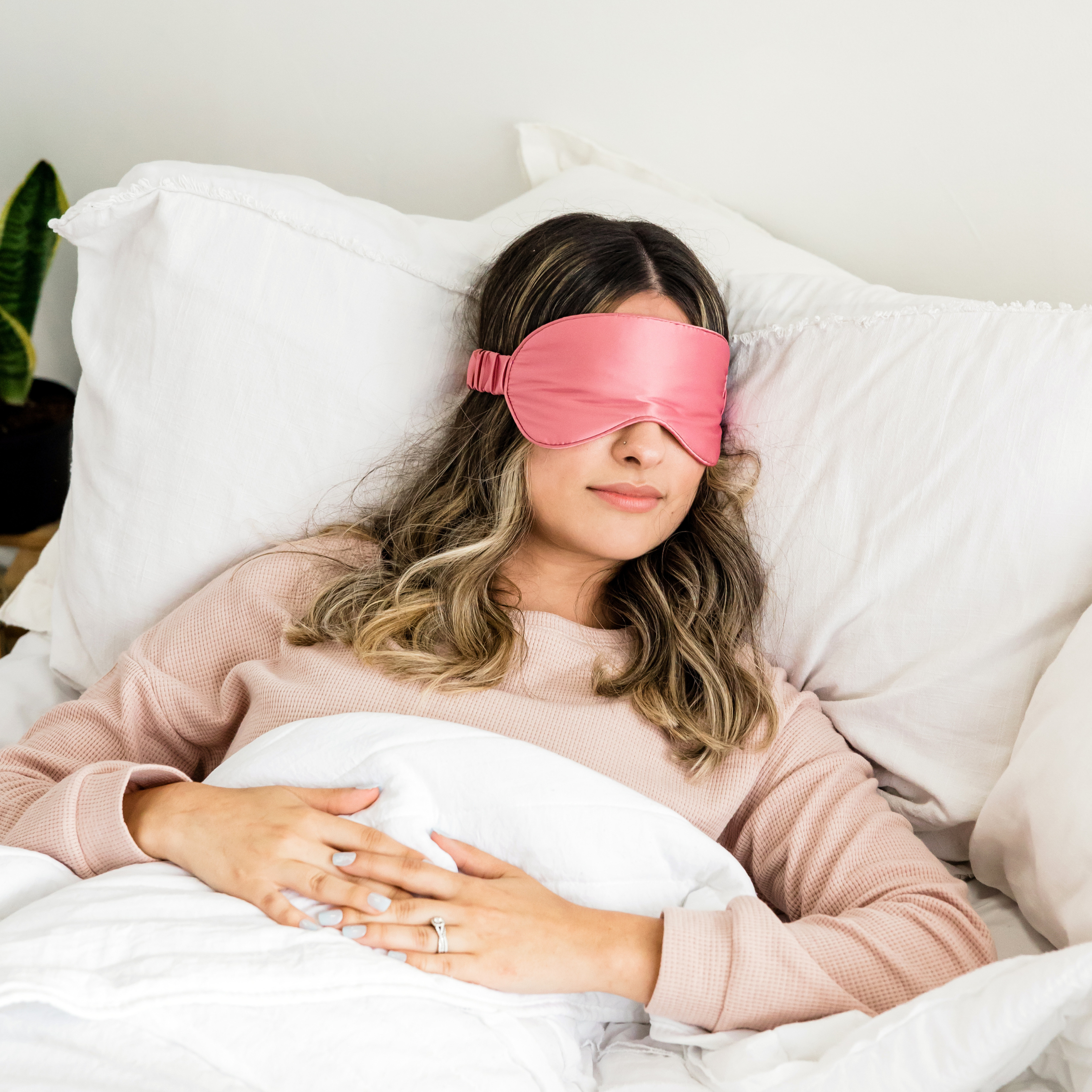 Women asleep in bed 