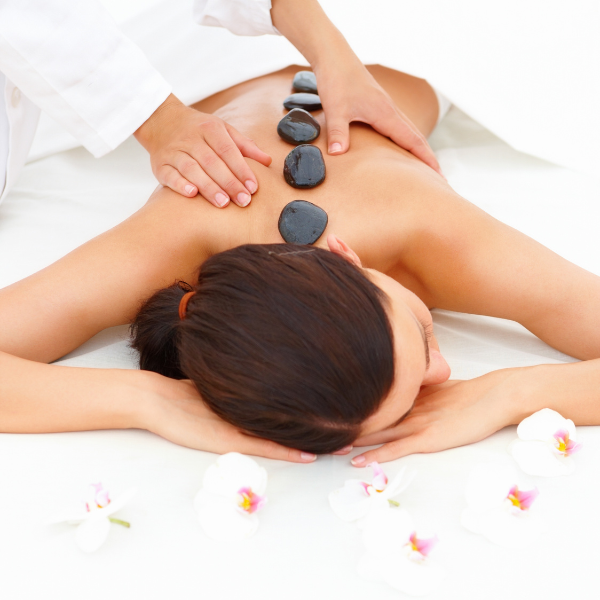 woman having a hot stone massage 